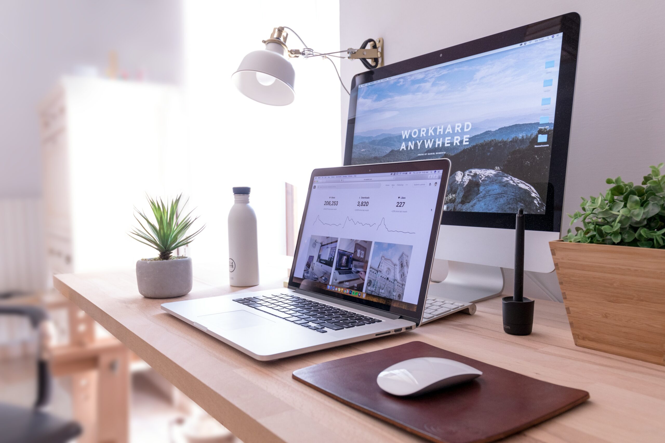 SEO services Houston website reconstruction workspace with analytics displayed on laptop and desktop