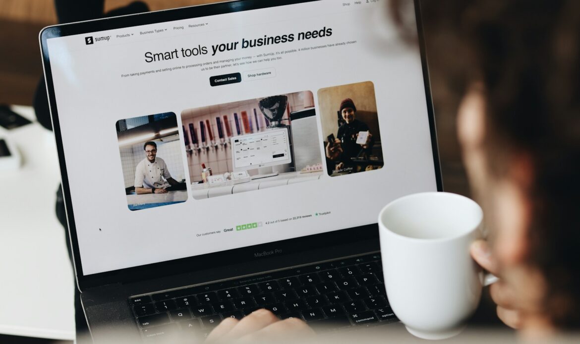 Small business owner working on a website on a laptop