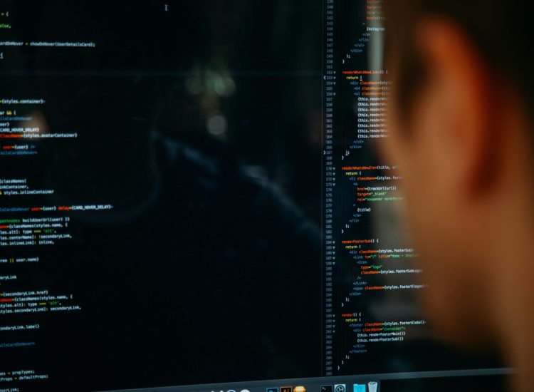 Developer coding during website reconstruction services project